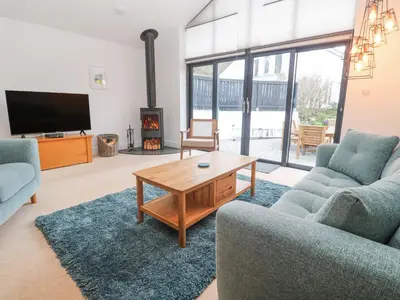 a living room with two couches and a coffee table at Chy Benyngoth in Hayle