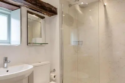 a bathroom with a shower and a toilet and a sink at 2 Bed in Launceston oc-f30999 in Lewannick