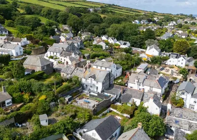 an aerial view of a small village with houses at First-Floor Georgian Apartment with Terrace and Sea Views in Boscastle in Boscastle