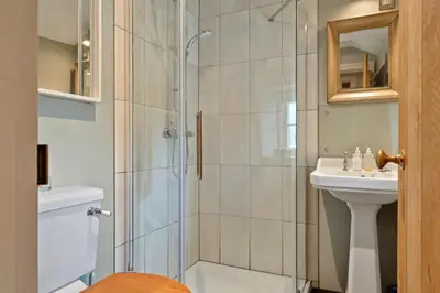 a bathroom with a shower and a sink at Finest Retreats - St Eval School House in Saint Ervan