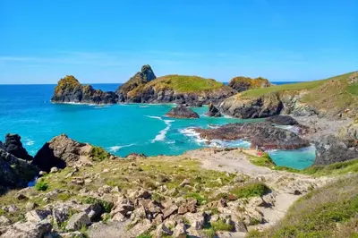 a view of a beach with rocks and the ocean at 4 Bed in St. Keverne oc-t31085 in Saint Keverne