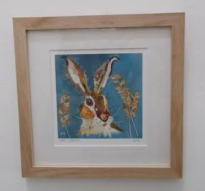 a picture of a rabbit in a frame on a wall at The Barn At Collacott in North Petherwin