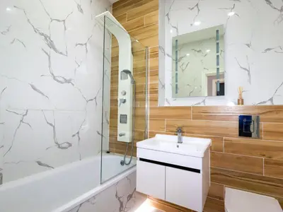 a bathroom with a sink and a shower at Priory in St Austell