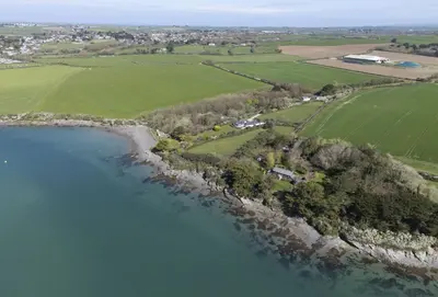 an aerial view of the shoreline of a lake at Schoopers - Holiday Home in Rock in Padstow