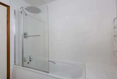 a shower with a glass door in a bathroom at 3 Menague in Padstow