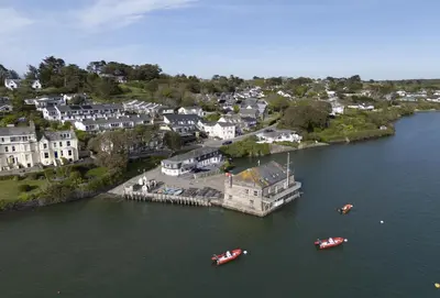 an aerial view of a town with boats in the water at Aloe Cottage in Padstow