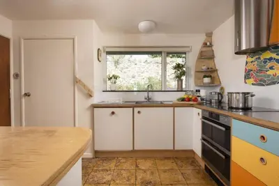 a kitchen with a sink and a counter top at Rabbit Hill in Polzeath