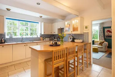 a kitchen with a large island in the middle at Trerair in Saint Minver