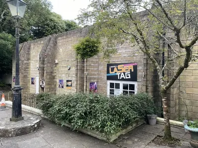 a sign on the side of a building at Satinwood in Newquay