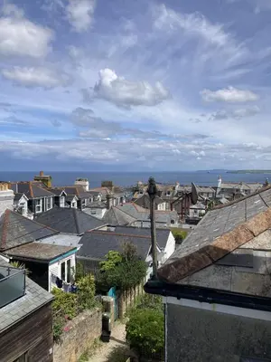 a view of a city with houses and the ocean at Flat 4, 10 Porthminster Terrace in St Ives