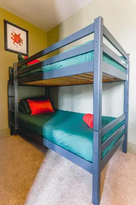 a bunk bed room with two bunk beds at Smarties Guest House in Newquay