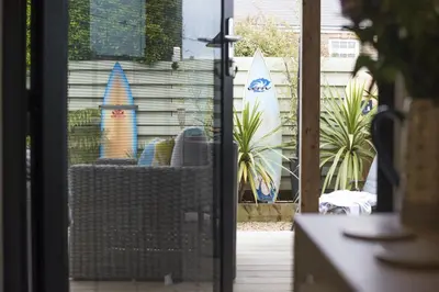 a view of a patio from a sliding glass door at Two Bare Feet in Truro