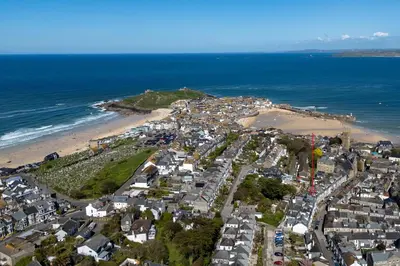 an aerial view of a city and the beach at High Tide Bedford Rd Boutiques in St Ives