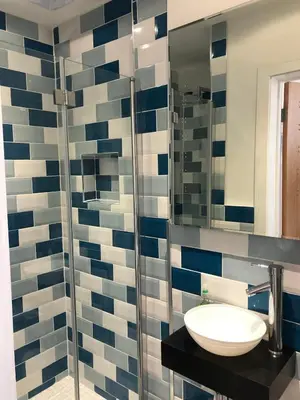 a bathroom with a sink and a mirror at Dixies View - 2 bed apartment - Central St Ives in St Ives