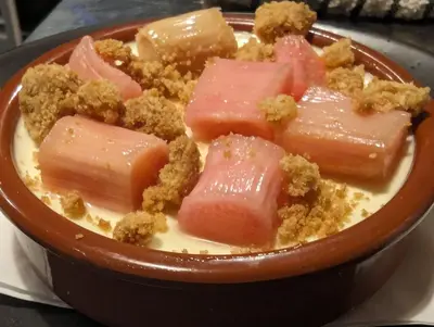 a bowl of food with meat and bread on a table at OXOX - Room Only Accommodation in Polperro