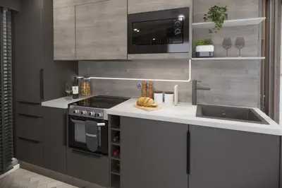 a kitchen with a sink and a stove at St. Ives Holiday Village in St Ives