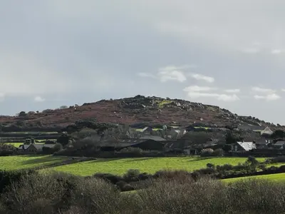 a hill in the middle of a green field at The Balnoon Inn B&B in St Ives