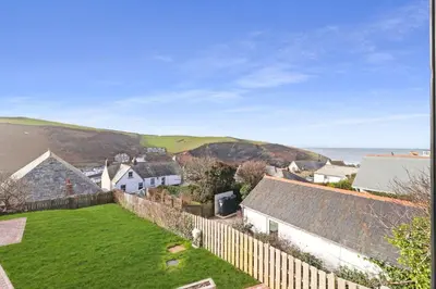 a view from the roof of a house with green grass at Keynvor View in Port Isaac