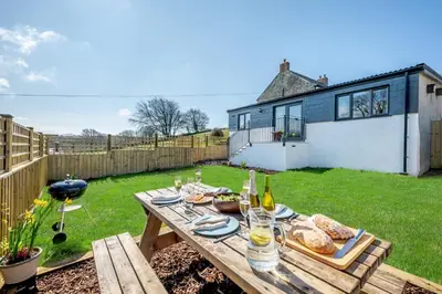 a picnic table in the backyard of a house at 2 Bed in Altarnun oc-t31858 in Altarnun