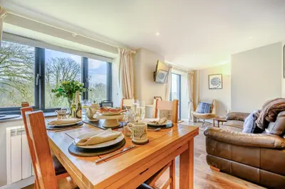 a dining room with a table with food on it at 2 Bed in Altarnun oc-t31858 in Altarnun