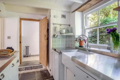 a kitchen with a sink and a window at 3 Bed in St. Teath oc-r31945 in Saint Teath