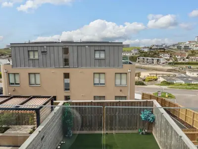 a view of a building from a balcony at Ebbtide in Newquay