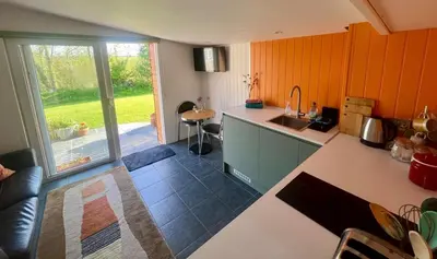 a kitchen with a sink and a counter top at The Escape in Crackington Haven
