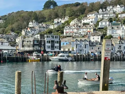 a group of people in a boat in the water at Character 3 Bed Cottage, Close to Waters edge, Parking in Looe