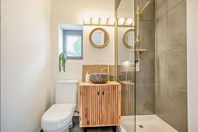 a bathroom with a toilet and a shower at 4 Bed in Penryn oc-c27969 in Penryn