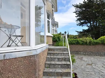 a set of stairs leading up to a house at Falmouth Bay 1 in Falmouth