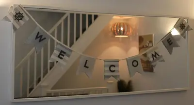 a mirror with the words mexico on a staircase at 4 St Eia - Happy Place in St Ives