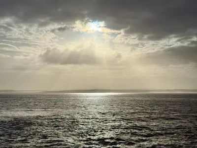 a large body of water with a cloudy sky at 4 St Eia - Happy Place in St Ives