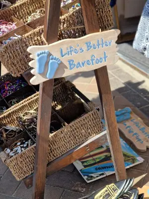 a sign that reads lifes better bavoor at Dune Breeze-Haven Perran Sands Holiday Park in Perranporth