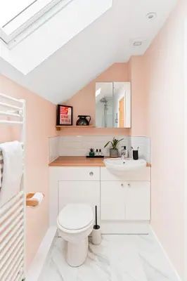 a bathroom with a toilet and a sink at Peaceful Harbour-View Cottage - Tresellick Gardens in Flushing