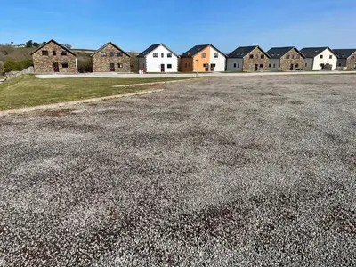 a large parking lot with a row of houses at Retallack hot tub lodge - 4 ensuites - luxury stay in Saint Columb Major