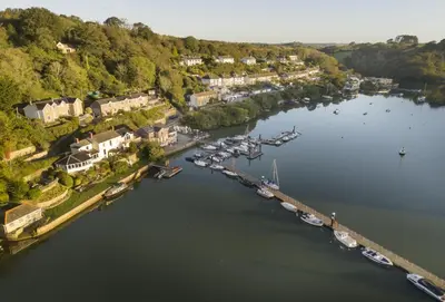 an aerial view of a harbor with boats in the water at The Old Chapel in Saint Clement