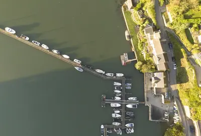 an overhead view of a marina with parked boats at The Old Chapel in Saint Clement