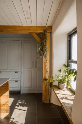 a hallway with a door and a window at 5 Star Large Farmhouse Near The Beach With Hot Tub & Sauna - Porth, Near Newquay in Saint Columb Minor
