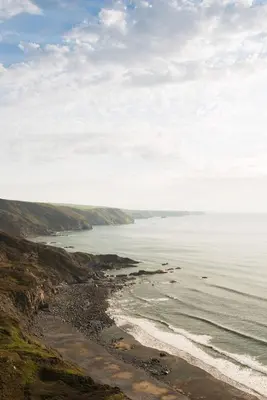 a view of the ocean from a hill at Trevigue Cottage in Bude