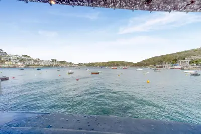 a view of a large body of water with boats at 2 Bed in Polruan oc-w31943 in Fowey