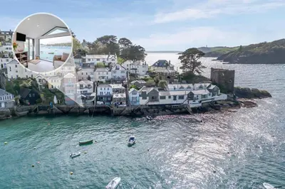 an aerial view of a town on a body of water at 2 Bed in Polruan oc-w31943 in Fowey