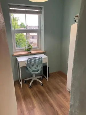 an office with a desk and a chair in front of a window at Knockers Retreat, St Agnes in St. Agnes