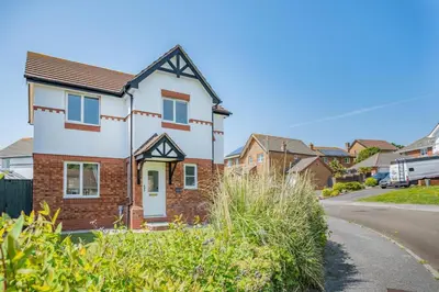 a house on a street in a residential neighbourhood at 3 Bed in Newquay oc-c30862 in Newquay