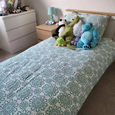 a group of stuffed animals sitting on a bed at House in Cornwall in Redruth
