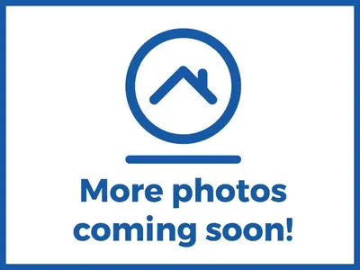 a sign that says more photos coming soon at The Copper House in Truro