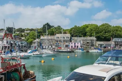 a group of boats docked in a harbor at 3 Bed in Egloshayle oc-m32201 in Egloshayle