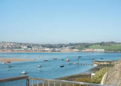 a large body of water with boats in it at 1 The Terrace in Padstow