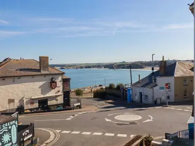 a view of the ocean from a street at Beach View House in Newquay
