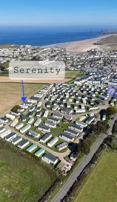 an aerial view of a parking lot near the ocean at Serenity in Truro