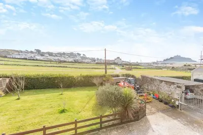 a view of a field from the balcony of a house at 3 Bed in Marazion oc-m30668 in Marazion